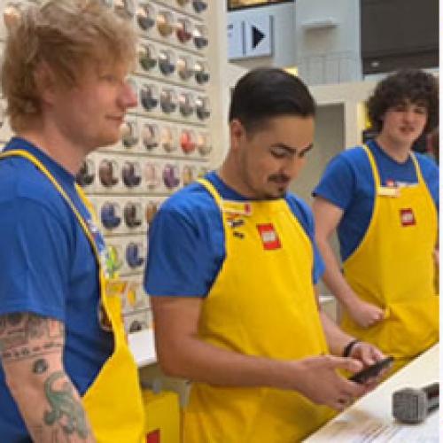 Ed Sheeran Gets Meta, Performs 'Lego House' While Working At Lego Store
