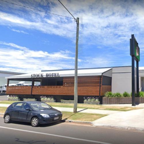 Two women charged after man allegedly set alight outside Qld pub