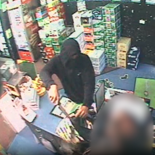 Vision released of terrifying armed robbery at Robina bottle-o as manhunt continues