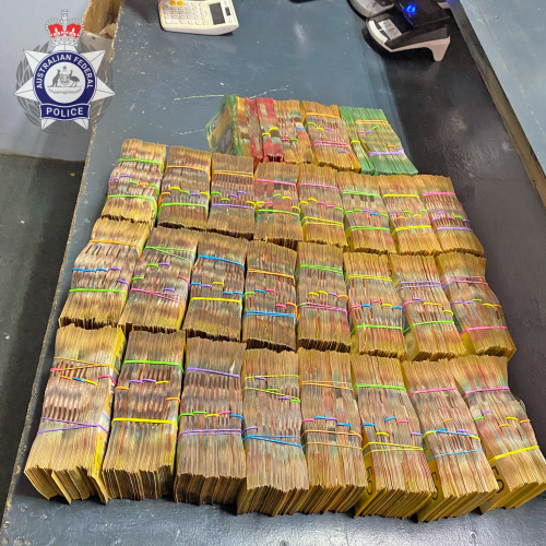 Man charged over huge haul of cash at Gold Coast Airport