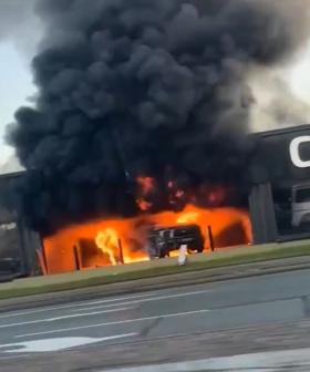 Man charged over ferocious blaze at Gold Coast rental car business