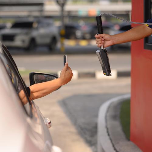 Can You Be Fined For Using Your Phone To Pay At A Drive-Thru Window?